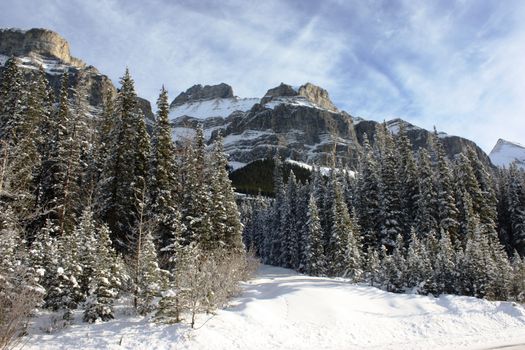 Canadian mountain peak under a blue sky