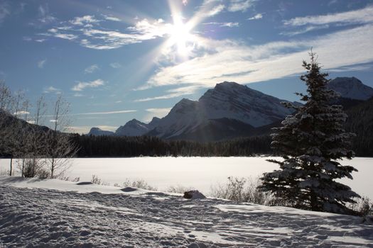 Canadian mountain peak under a blue sky