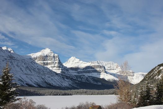 Canadian mountain peak under a blue sky