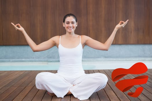 Peaceful happy woman in white sitting in lotus pose against heart