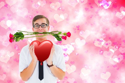 Romantic geeky hipster against digitally generated girly heart design