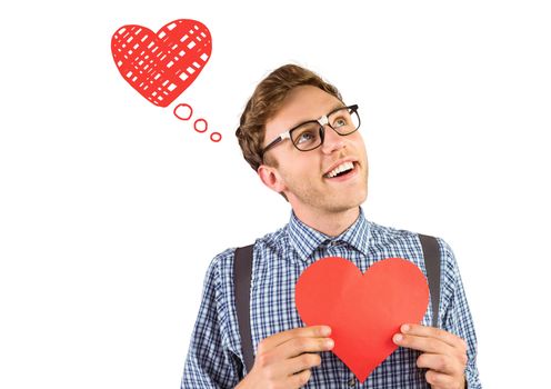 Geeky hipster holding a heart card against heart