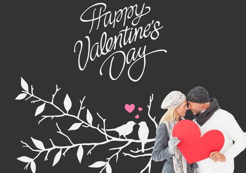 Smiling couple in winter fashion posing with heart shape against cute valentines message