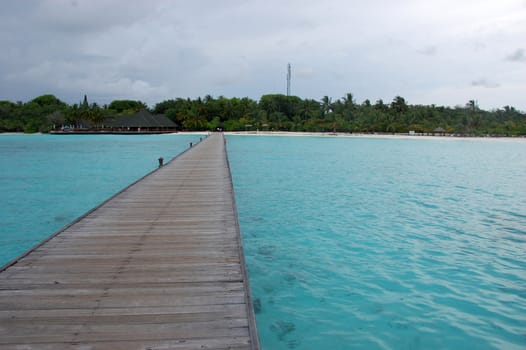 Timber pier at Maldives Paradise island