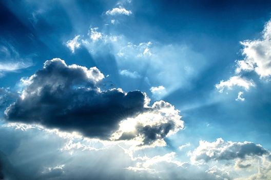 Blue sky with white cloud and sun