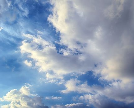 Blue sky with white cloud and sun