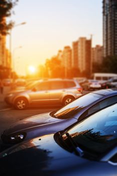 cars in street  at sunset