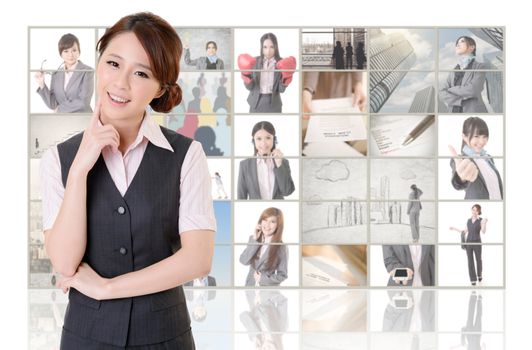 Attractive Asian business woman standing in front of TV screen wall, closeup portrait.