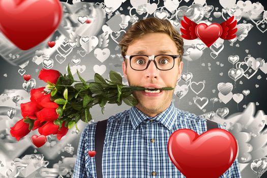 Geeky hipster biting a bunch of roses against grey valentines heart pattern