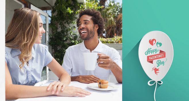 Happy couple having coffee together  against valentines day greeting