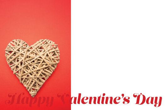 Wicker heart ornament  against cute valentines message