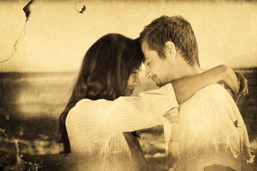 Couple embracing each other on the beach against grey background