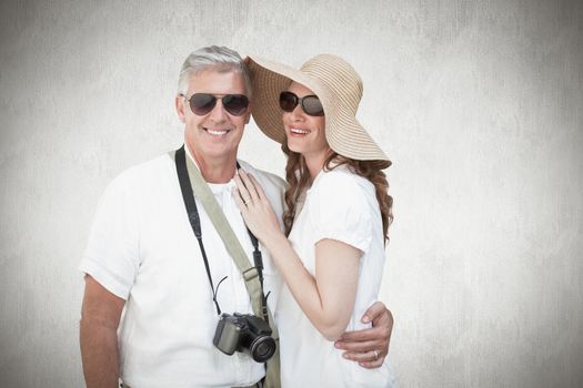 Vacationing couple against white background