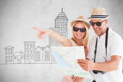 Happy tourist couple using map and pointing against white background