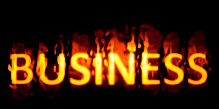 An image of a burning word business
