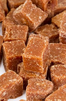 pile of unclarified organic brown cane sugar cube