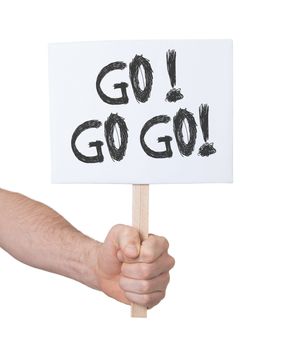 Hand holding sign, isolated on white - Go