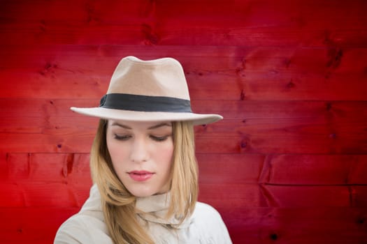 Pretty hipster blonde against wooden planks background