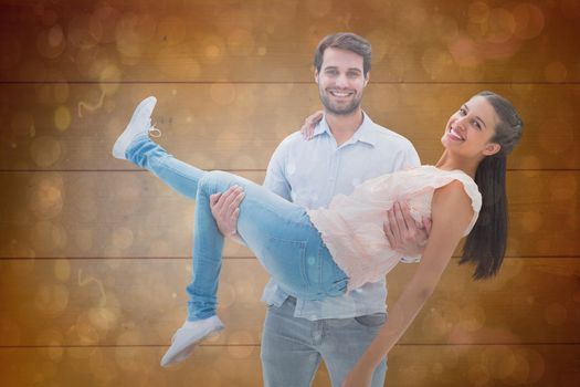 Attractive young couple having fun against dark abstract light spot design