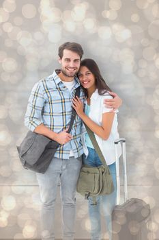 Attractive young couple going on their holidays against light glowing dots design pattern