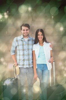 Attractive young couple going on their holidays against light design shimmering on green