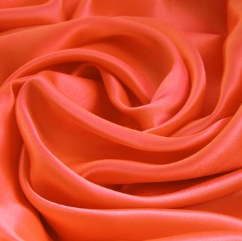 Smooth elegant orange silk or satin can use as background 