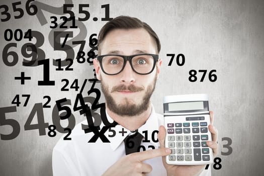 Geeky businessman pointing to calculator  against white background