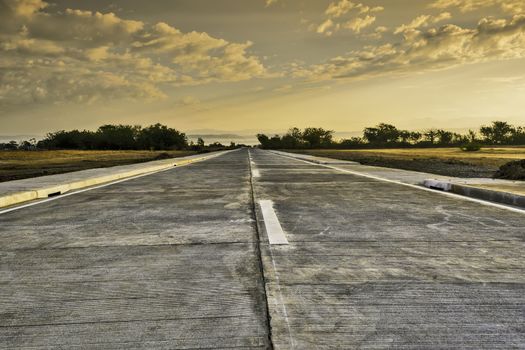 Newly built concrete road leading to a resort, Philippines