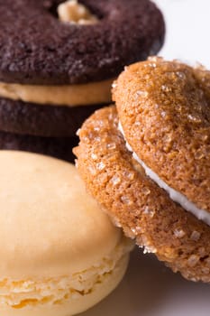 Three different types of sweet cookies: chocolate, ginger and lemon.