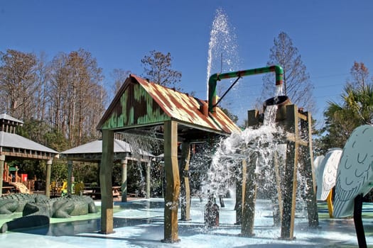 A splash park with a lot of water