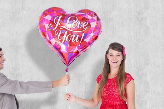 Geeky hipster offering red heart shape balloon to his girlfriend against white background