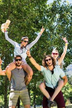 Happy friends having fun together on a summers day