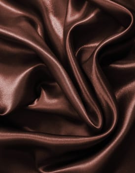 Smooth elegant dark brown chocolate silk can use as background