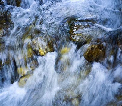 abstract background or texture blue rapid river