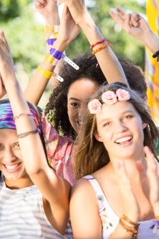 Excited music fans at festival on a summers day