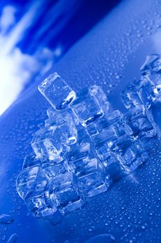 Ice cubes on blue background