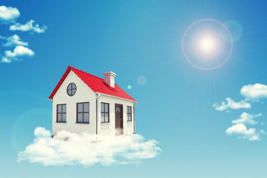 White house with red roof, brown door and chimney in cloud. Background sun shines brightly. Blue sky