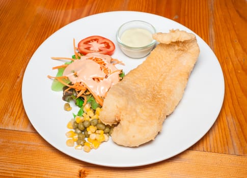 Fish Steak with Salad.