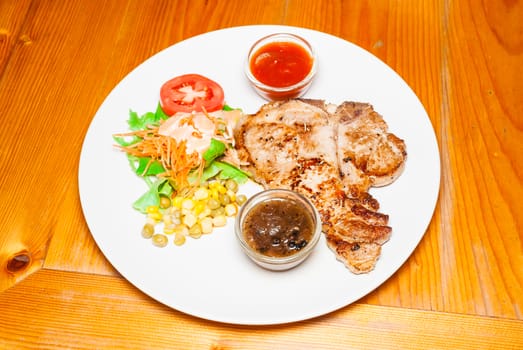 Pork Steak with Salad.