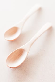 Two of new wooden spoons, stock photo