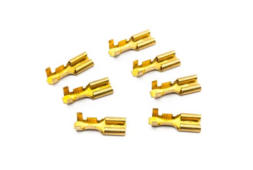 Pile of Gold Crimp Terminal Connectors.