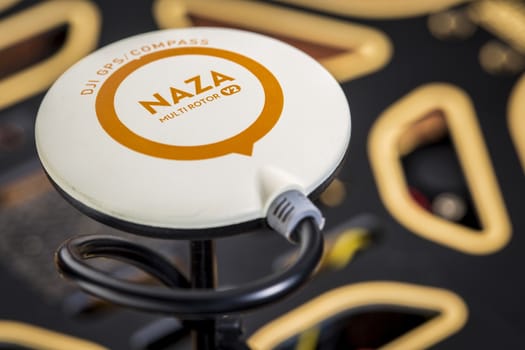 FORT COLLINS, CO, USA, February 09,  2015:  GPS antenna of NAZA flight control system for multirrotor drone mounted on a hexacopter  frame,