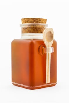 Honey Bottle with Cork Cap and Wood Spoon.