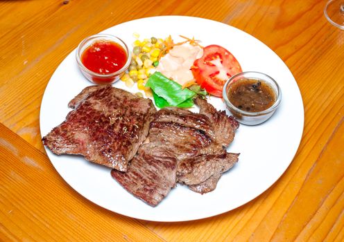 Ostrich Steak with Salad.