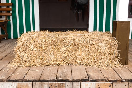 Dried Straw on Wood Floor.