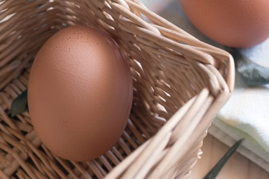 composition of eggs in a basket with natural light