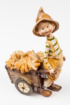 Boy Doll with Corn Cart.