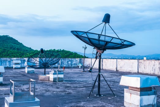 Satellite Dishes on the Rooftop.