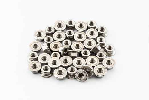 Pile of Stainless Steel Hex Flange Nuts.