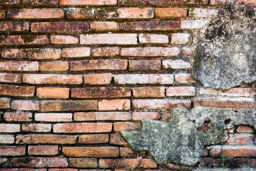 Old Deformed Brick Wall Background/Texture.